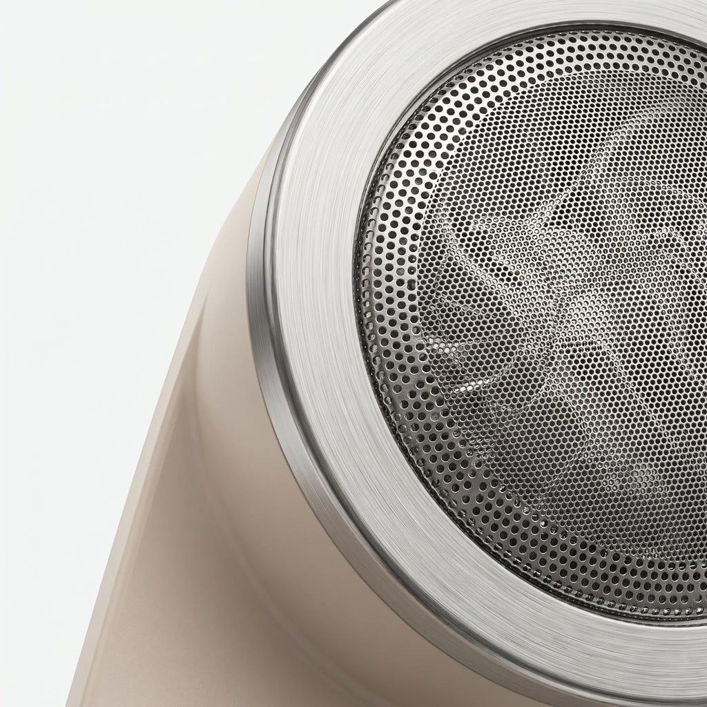 Close-up of the Wova Renew fabric shaver perforated mesh head