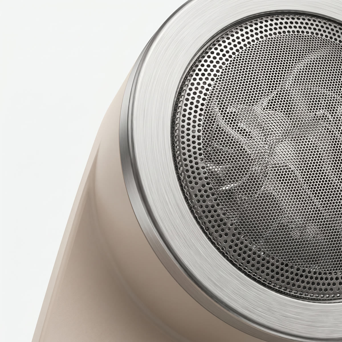 Close-up of the Wova Renew fabric shaver perforated mesh head